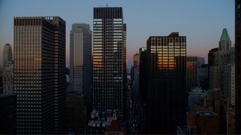 Movie still from “World Trade Center” (2006), directed by Oliver Stone – A view of a city skyline at sunset; Extreme Wide shot, High angle