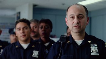 Movie still from “World Trade Center” (2006), directed by Oliver Stone – A group of police officers standing next to each other; Close Up shot, Low angle