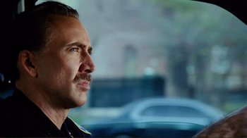 Movie still from “World Trade Center” (2006), directed by Oliver Stone – A person with a mustache; Close Up shot, Over the shoulder angle