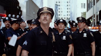 Movie still from “World Trade Center” (2006), directed by Oliver Stone – A group of men in police uniforms standing next to each other; Medium shot, Low angle