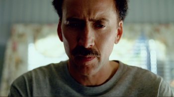 Movie still from “World Trade Center” (2006), directed by Oliver Stone – A person with a mustache; Close Up shot, Over the shoulder angle