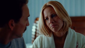 Movie still from “World Trade Center” (2006), directed by Oliver Stone – A man and a woman in a bathrobe looking at each other; Close Up shot, Over the shoulder angle