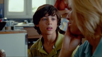 Movie still from “World Trade Center” (2006), directed by Oliver Stone – A young boy is talking to a woman; Close Up shot, Over the shoulder angle