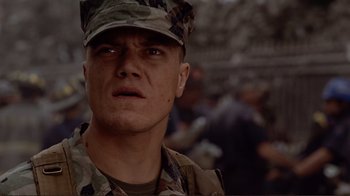 Movie still from “World Trade Center” (2006), directed by Oliver Stone – A man in a military uniform stares into the distance; Close Up shot, Low angle