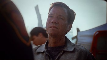 Movie still from “World Trade Center” (2006), directed by Oliver Stone – A person wearing a jacket; Close Up shot, Low angle