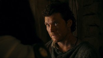 Movie still from “Wrath of the Titans” (2012), directed by Jonathan Liebesman – A person with a beard; Close Up shot, Over the shoulder angle