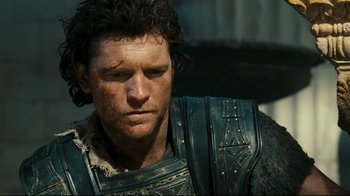 Movie still from “Wrath of the Titans” (2012), directed by Jonathan Liebesman – A person wearing armor; Close Up shot, Low angle