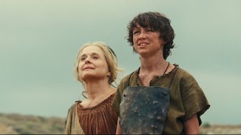 Movie still from “Wrath of the Titans” (2012), directed by Jonathan Liebesman – A woman and a man standing next to each other; Medium shot, Low angle