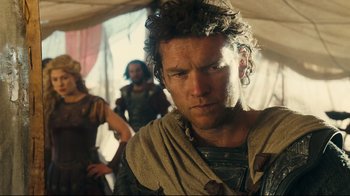 Movie still from “Wrath of the Titans” (2012), directed by Jonathan Liebesman – A person wearing a costume; Close Up shot, Over the shoulder angle
