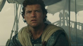 Movie still from “Wrath of the Titans” (2012), directed by Jonathan Liebesman – A person wearing a costume; Close Up shot, Low angle