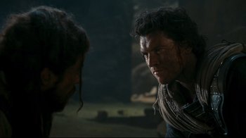 Movie still from “Wrath of the Titans” (2012), directed by Jonathan Liebesman – A man with a beard is looking at another man; Close Up shot, Over the shoulder angle