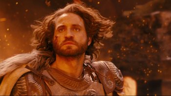 Movie still from “Wrath of the Titans” (2012), directed by Jonathan Liebesman – A person wearing armor; Close Up shot, Low angle