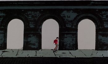 Movie still from “Yellow Submarine” (1968), directed by George Dunning – A man standing in front of an archway on a sidewalk; Extreme Wide shot, Overhead angle