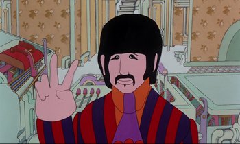 Movie still from “Yellow Submarine” (1968), directed by George Dunning – A cartoon of a man with a beard and a purple hat; Close Up shot, Overhead angle
