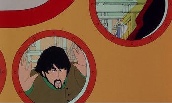 Movie still from “Yellow Submarine” (1968), directed by George Dunning – A cartoon picture of a man with a beard and mustache; Medium shot, Overhead angle