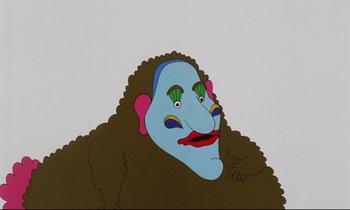 Movie still from “Yellow Submarine” (1968), directed by George Dunning – An animation of a woman with blue face and curly hair; Extreme Close Up shot, Low angle