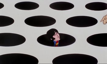Movie still from “Yellow Submarine” (1968), directed by George Dunning – A cartoon of a man in a hat looking into a hole in the ground; Extreme Wide shot, Overhead angle