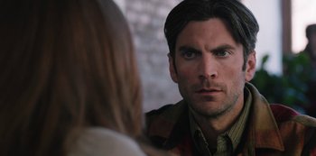 Movie still from “Yellowstone” (2018), created by John Linson – A person looking at a mirror; Close Up shot, Over the shoulder angle