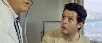 Movie still from “Yesterday, Today and Tomorrow” (1963), directed by Vittorio De Sica – A person sitting in front of a mirror; Close Up shot, High angle