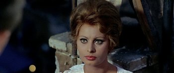 Movie still from “Yesterday, Today and Tomorrow” (1963), directed by Vittorio De Sica – A person wearing a white shirt; Close Up shot, Low angle