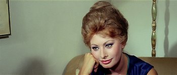 Movie still from “Yesterday, Today and Tomorrow” (1963), directed by Vittorio De Sica – A person wearing a dress; Close Up shot, High angle