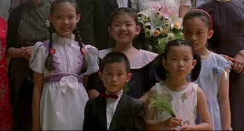 Movie still from “Yi Yi” (2000), directed by Edward Yang – A group of young people posing for a picture; Close Up shot, High angle