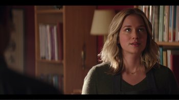 Movie still from “You” (2018), created by Sera Gamble – A woman with blonde hair is looking to her left; Close Up shot, Over the shoulder angle