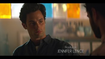 Movie still from “You” (2018), created by Sera Gamble – A person in a dark room; Close Up shot, Over the shoulder angle