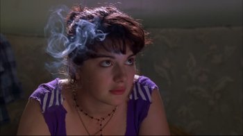 Movie still from “You Can Count on Me” (2000), directed by Kenneth Lonergan – A woman sitting in a room with smoke coming out of her head; Close Up shot, Low angle