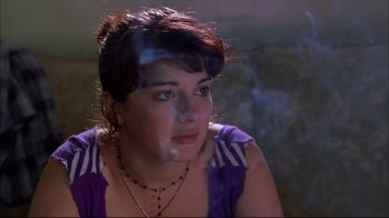 Movie still from “You Can Count on Me” (2000), directed by Kenneth Lonergan – A person sitting in front of a wall; Close Up shot, Low angle
