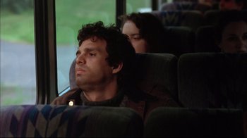Movie still from “You Can Count on Me” (2000), directed by Kenneth Lonergan – A man and a woman sitting on a bus; Medium shot, Over the shoulder angle