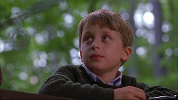 Movie still from “You Can Count on Me” (2000), directed by Kenneth Lonergan – A young boy is looking up at the sky; Close Up shot, Low angle
