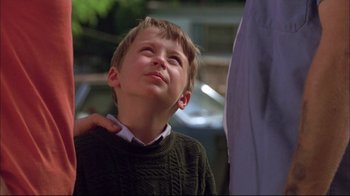 Movie still from “You Can Count on Me” (2000), directed by Kenneth Lonergan – A young boy looking up at the sky; Close Up shot, Low angle
