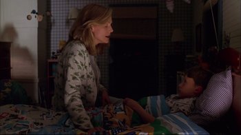 Movie still from “You Can Count on Me” (2000), directed by Kenneth Lonergan – A woman and a child in a bedroom; Medium shot, Over the shoulder angle