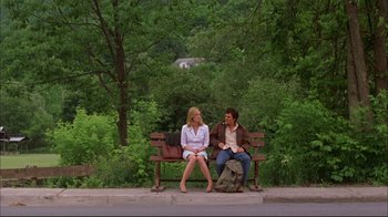 Movie still from “You Can Count on Me” (2000), directed by Kenneth Lonergan – A man and a woman sitting on a park bench; Wide shot, High angle