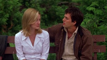 Movie still from “You Can Count on Me” (2000), directed by Kenneth Lonergan – A man and a woman sitting next to each other on a park bench; Medium shot, Over the shoulder angle
