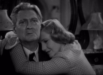 Movie still from “You Can't Take It with You” (1938), directed by Frank Capra – An older man and a younger woman hugging; Close Up shot, High angle