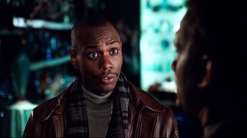 Movie still from “You've Got Mail” (1998), directed by Nora Ephron – A man in a leather jacket and a scarf; Close Up shot, Over the shoulder angle