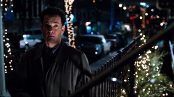 Movie still from “You've Got Mail” (1998), directed by Nora Ephron – A man standing in front of a railing at night; Medium shot, Over the shoulder angle