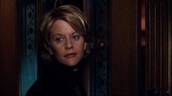 Movie still from “You've Got Mail” (1998), directed by Nora Ephron – A person with short blonde hair; Close Up shot, Over the shoulder angle