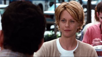 Movie still from “You've Got Mail” (1998), directed by Nora Ephron – A person talking to another person; Close Up shot, Over the shoulder angle