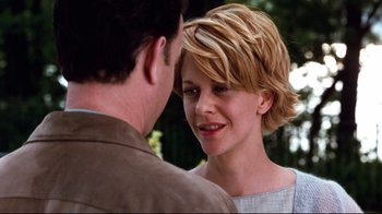 Movie still from “You've Got Mail” (1998), directed by Nora Ephron – A man and a woman talking to each other; Close Up shot, Over the shoulder angle