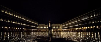 Movie still from “Youth” (2015), directed by Paolo Sorrentino – A man standing in the middle of a courtyard at night; Extreme Wide shot, Low angle
