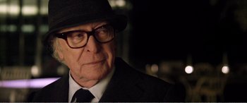 Movie still from “Youth” (2015), directed by Paolo Sorrentino – An older man wearing a hat and glasses; Close Up shot, Over the shoulder angle