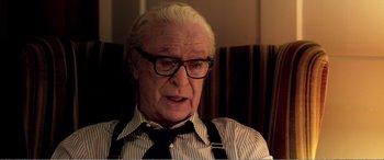 Movie still from “Youth” (2015), directed by Paolo Sorrentino – An older man wearing glasses and wearing a tie; Close Up shot, Over the shoulder angle