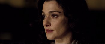 Movie still from “Youth” (2015), directed by Paolo Sorrentino – A woman's face in the dark; Close Up shot, Over the shoulder angle