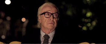 Movie still from “Youth” (2015), directed by Paolo Sorrentino – An older man wearing a suit and tie; Close Up shot, Low angle