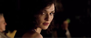 Movie still from “Youth” (2015), directed by Paolo Sorrentino – A woman's face in the dark; Close Up shot, Over the shoulder angle