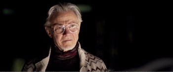 Movie still from “Youth” (2015), directed by Paolo Sorrentino – An older man wearing glasses and a sweater; Close Up shot, Low angle