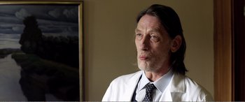 Movie still from “Youth” (2015), directed by Paolo Sorrentino – An older man wearing a white shirt and a tie; Close Up shot, Low angle